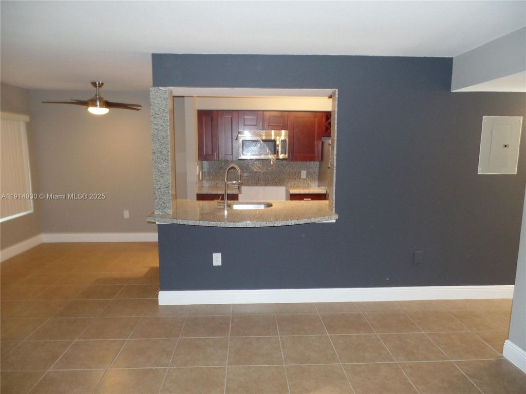 Photo of 2405 NW 33rd St #1209, Oakland Park, FL 33309 (MLS # A11914830)