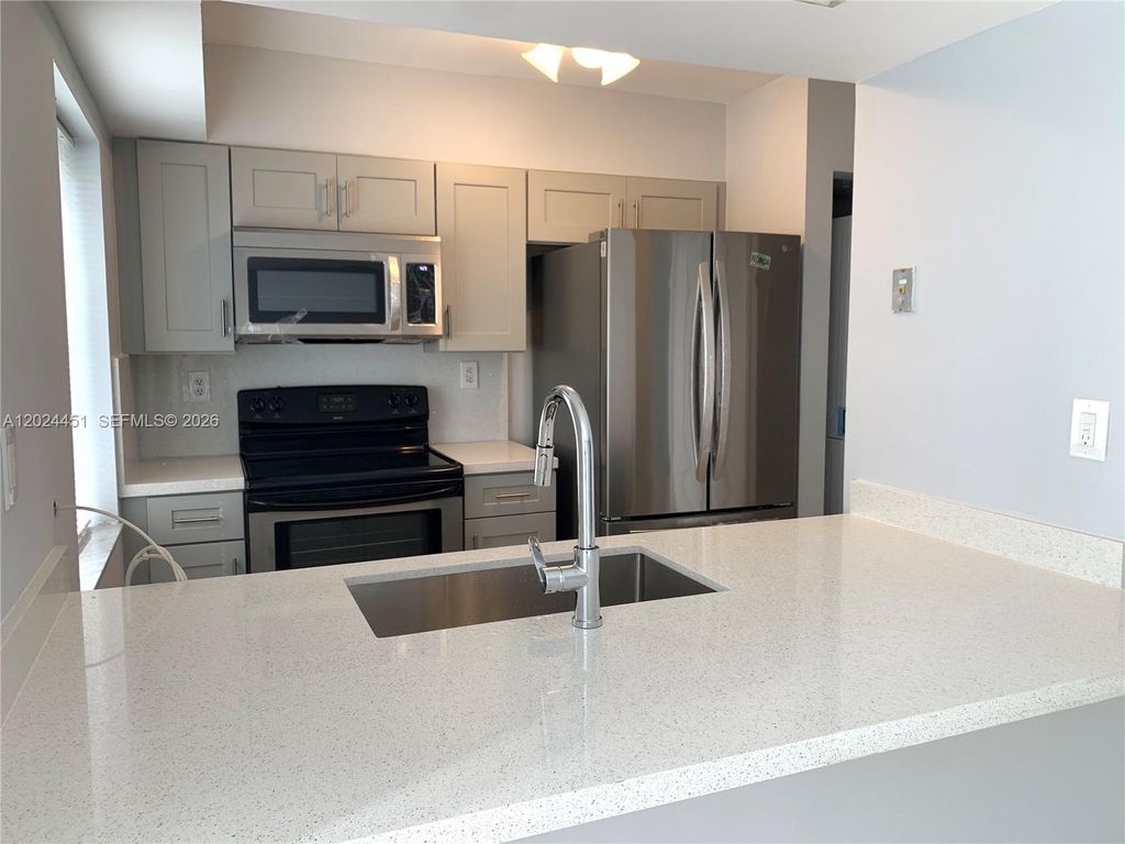 Photo of 143 Riviera Cir #143, Weston, FL 33326 (MLS # A12024451)