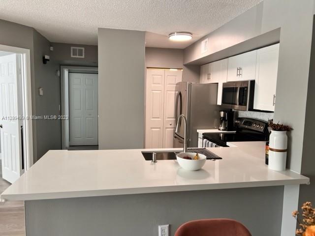 DEVONAIRE CONDO AT PEMBRO - Residential