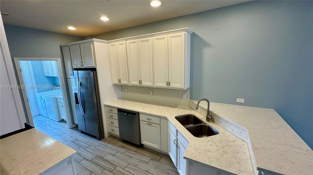 Photo of 3973 Poinciana Ln, Hollywood, FL 33021 (MLS # A11961102)