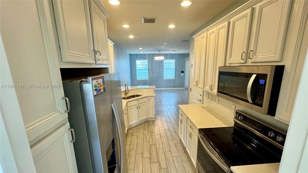 Photo of 3973 Poinciana Ln, Hollywood, FL 33021 (MLS # A11961102)