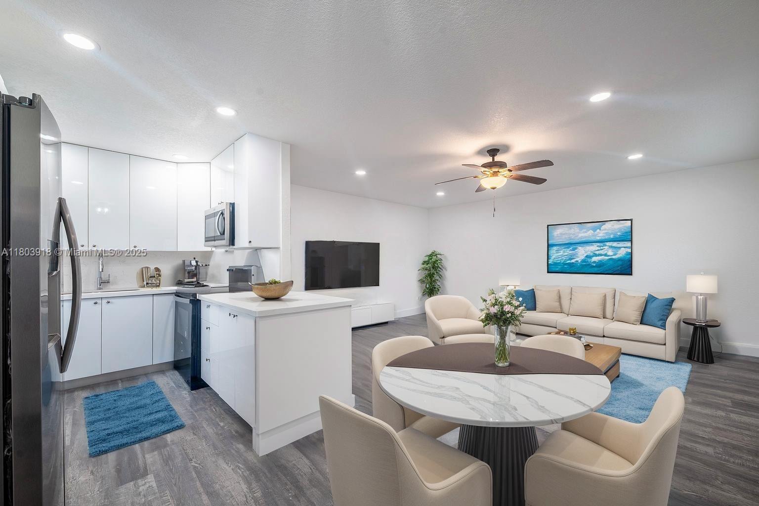 55+ Community. This beautifully renovated 2-bedroom, 2-bath condo on the second floor is move-in ready and waiting for you! Step inside to discover modern finishes, brand-new appliances, and a bright, open living space that feels like home from the moment you walk in. Just 10 minutes from the beach, this community offers a lifestyle like no other: Indoor & outdoor private pools, fitness center, tennis & pickleballs courts, Billiards rooms & theaters, Easy private transportation for your daily convenience.