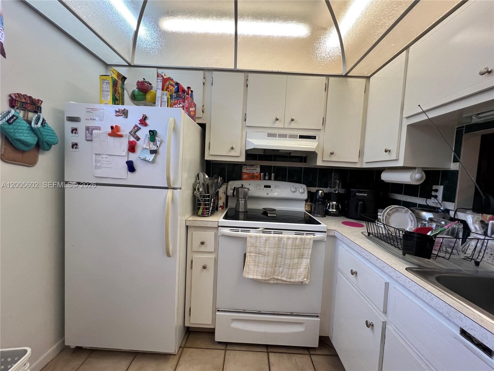 QUINSANA GARDENS CONDO - Residential