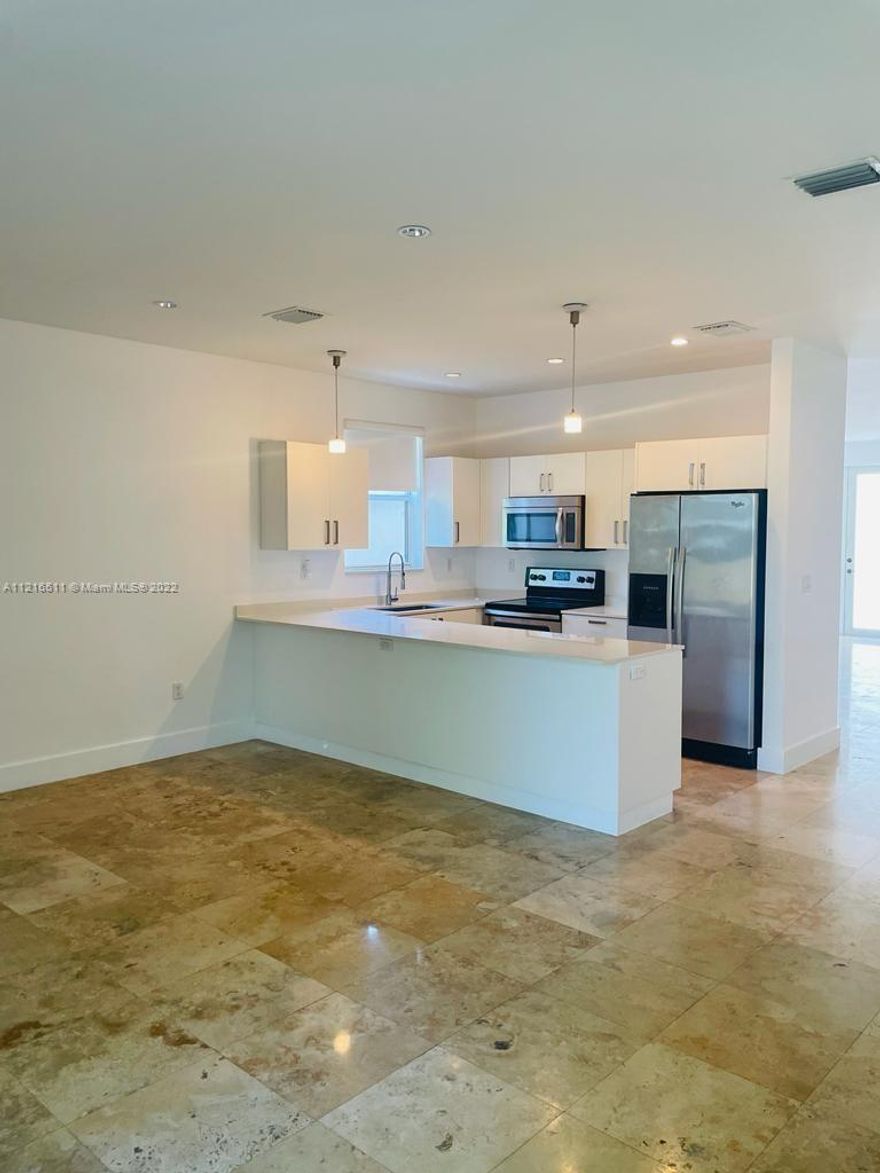 VERY CONVENIENT LOCATION! A beauty in Silver Bluff, just minutes to Coconut Grove and US 1 highway. Amazing 3 bed and 3.5 bath modern town home. Features marble floors throughout, impact windows and doors. Spacious living area. Open floor plan. Kitchen with white Italian cabinets and stainless steel appliances. Master bath features a jacuzzi and glass enclosed separate shower. Enjoy the sun in the garden or in the private pool of this home. Parking space for one car and a guest parking.