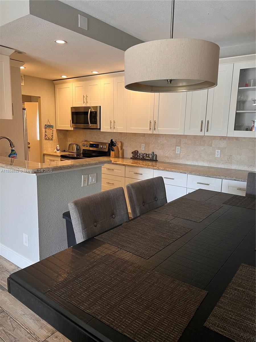 LADO DEL RIO CONDO - Residential Lease