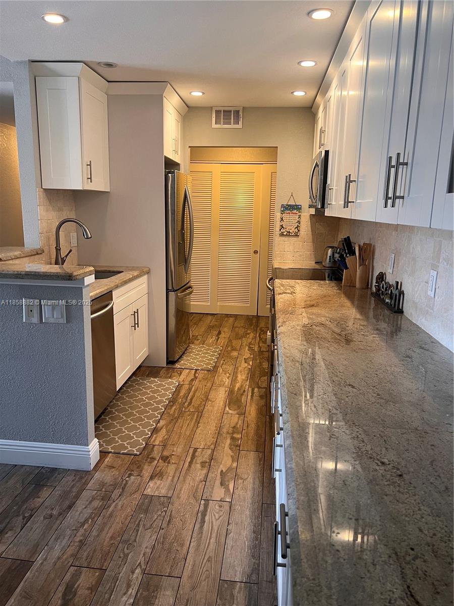 LADO DEL RIO CONDO - Residential Lease