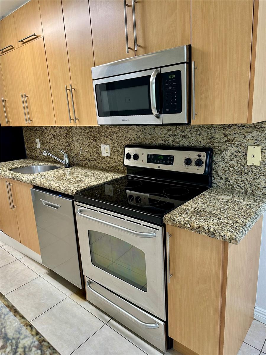 TUDOR MANOR CONDO - Residential Lease