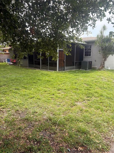 Tiny photo for 1100 NW 110th St, Miami, FL 33168 (MLS # A12027190)