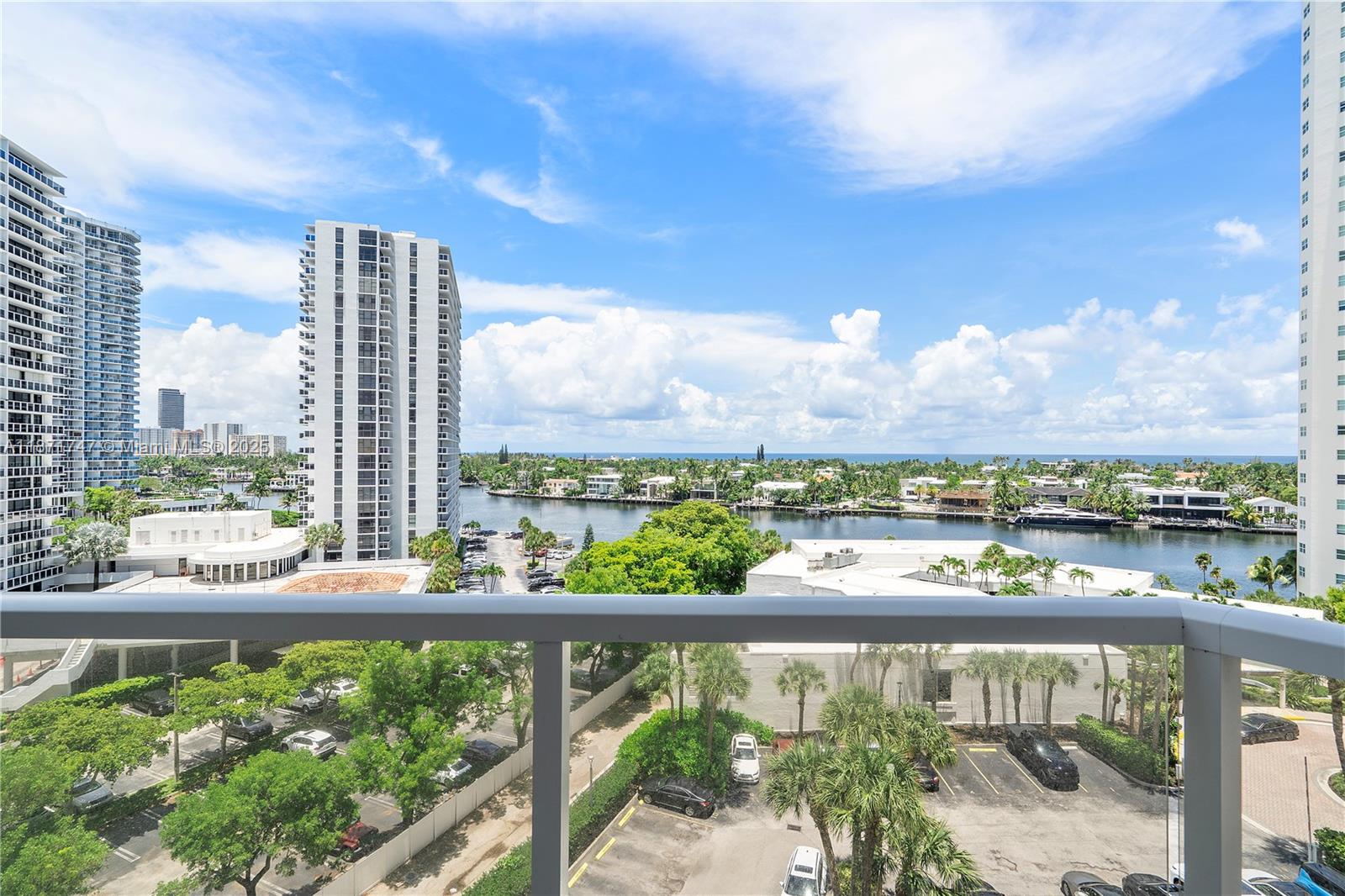 Luxury living at it's best in the gated complex of Hamptons West. Amazing direct intracoastal & ocean water views from this spacious 2/2 immaculate condo in the heart of Aventura. Elegant upgrades throughout, in-unit full size washer/dryer, could easily create a third bedroom from the den area if so desired. Amenities include garage parking & valet, two pools, cafe, market, movie theater, fitness center with sauna, spa, nail salon, party rooms, kids playroom, library, tennis and racquet ball courts, stunning clubhouse restaurants overlook the intracoastal. Short distance to Aventura mall, golf courses, parks & restaurants.