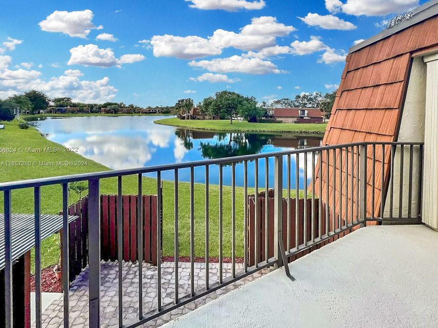 The Alonso Team is happy to announce this FULLY UPDATED Townhome with Lake Views in Davie! This beautifully updated 3bed, 2.5bath offering a perfect blend of modern style, comfort, and serene lake views. Featuring brand new KitchenAid stainless steel appliances and a new washer/dryer, this home has been thoughtfully upgraded throughout. Enjoy peace of mind with new impact windows and door. The home boasts new floors, a completely redesigned staircase and rails, and new baseboards and doors with fresh handles. Freshly painted and adorned with modern zebra window treatments, new ceiling fans, and new lighting for a stylish and cozy ambiance. Relax and unwind while taking in tranquil views of the lake. This move-in ready gem is perfect for those seeking a LOW HOA.