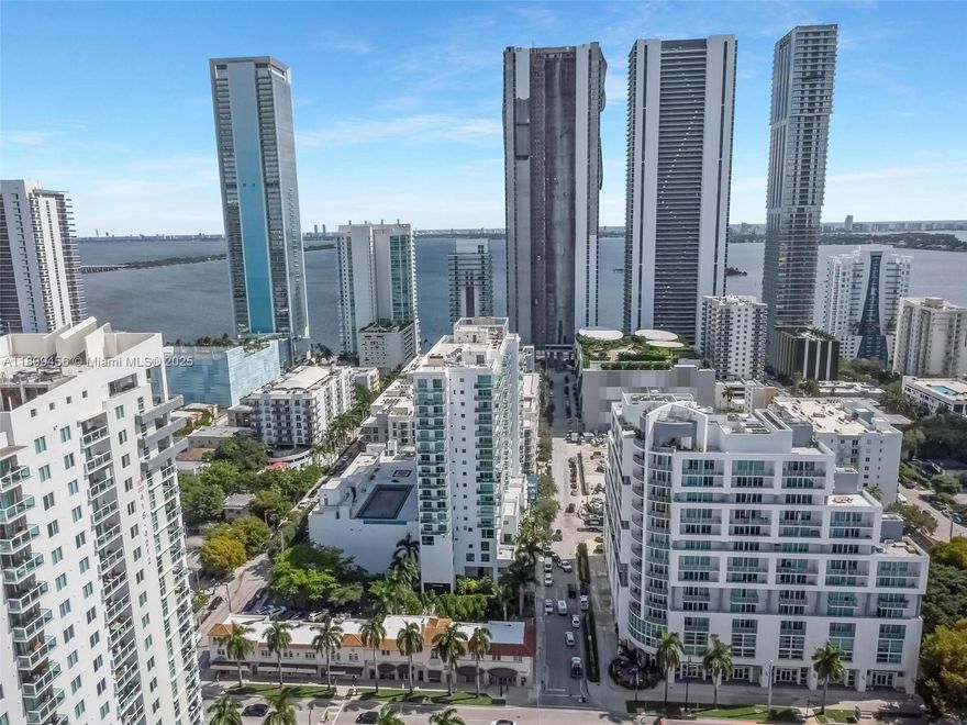 Experience elevated Miami living in this elegant 2-bedroom, 2-bath plus den residence at the Gallery Art Condominium in Edgewater. This beautifully designed home showcases an open, airy layout with sleek tile floors in the living areas and warm wood flooring in the bedrooms. The den provides an ideal space for an office or guest retreat. Floor-to-ceiling windows bathe the home in natural light, framing dynamic city views. Indulge in resort-style amenities including a modern fitness center, sparkling pool (soon to be), and 24-hour concierge. Perfectly positioned near Wynwood, Midtown, and the Design District for the ultimate urban lifestyle. Special Assessment will be paid by the Seller ! Pool should be done in the coming months !