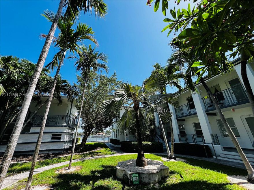 Fabulous life on the beach! STREET PARKING! Renovated and spacious two bedroom and one bath apartment on the beach! Stainless steel appliances, central air, wood and tile flooring! Beautiful courtyard for relaxing! Swimming pool facing the water! Walking distance to many restaurants, shops, stores and the beach!