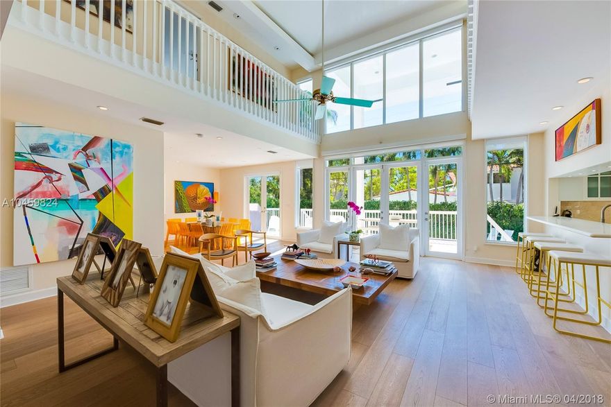This tropical modern Oasis, situated on the beautiful tree lined Cranwood Dr is one of the most sought after locations on Key Biscayne. Recently remodeled, the homes open floor plan, interior design and inviting exterior spaces define island living. Well characters thought out design and top of the line finishes were used in renovating this exquisite home, including a new metal roof, hardwood floors, brand new heated pool, backyard and landscaping. Lighting, sprinkler system, new elevated terrace, 170 sq ft nanny/guest quarters addition, newly renovated bathrooms and a new water heater.