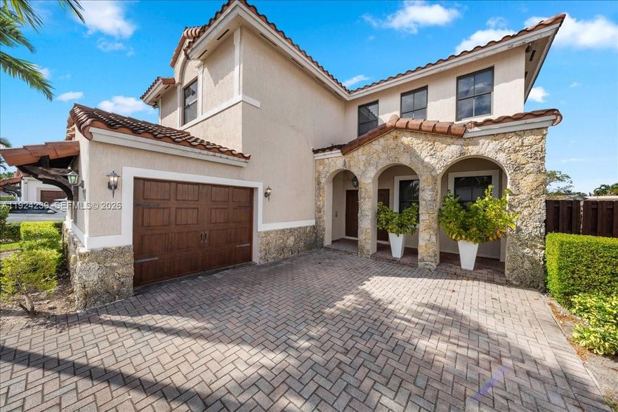 MOTIVATED SELLERS. Welcome to this exceptional 5-bedroom, 4.5-bath residence in the prestigious gated community of Las Ramblas, offering both luxury finishes and outstanding outdoor space.
The highlight of the property is its expansive covered patio and spacious backyard, designed for effortless entertaining and year-round enjoyment. Inside, the home showcases custom wood-panel upgrades, elegant curtains, impact windows, and high volume ceilings that create a bright and open atmosphere.
The main floor includes a full guest suite with its own bathroom, providing privacy and convenience. The heart of the home is the stylish kitchen, appointed with dark wood cabinetry, stainless steel appliances, and a welcoming breakfast area that blends practicality with design. Upstairs, the layout features four well-appointed bedrooms. The primary suite offers a serene retreat with dual sinks, a soaking tub, and separate shower. Two additional bedrooms share a Jack-and-Jill bathroom, while the fourth enjoys a private en-suite. The upper-level A/C was replaced in 2020.
A large driveway with room for four vehicles plus a 1-car garage. Residents of Las Ramblas enjoy a variety of amenities, including a clubhouse, gym, pool, tennis courts, and business center.
Ideally positioned near top-rated schools, major highways, shopping, and dining, this home combines comfort, upgraded style, and an unbeatable outdoor setting—perfect for families seeking space and sophistication.