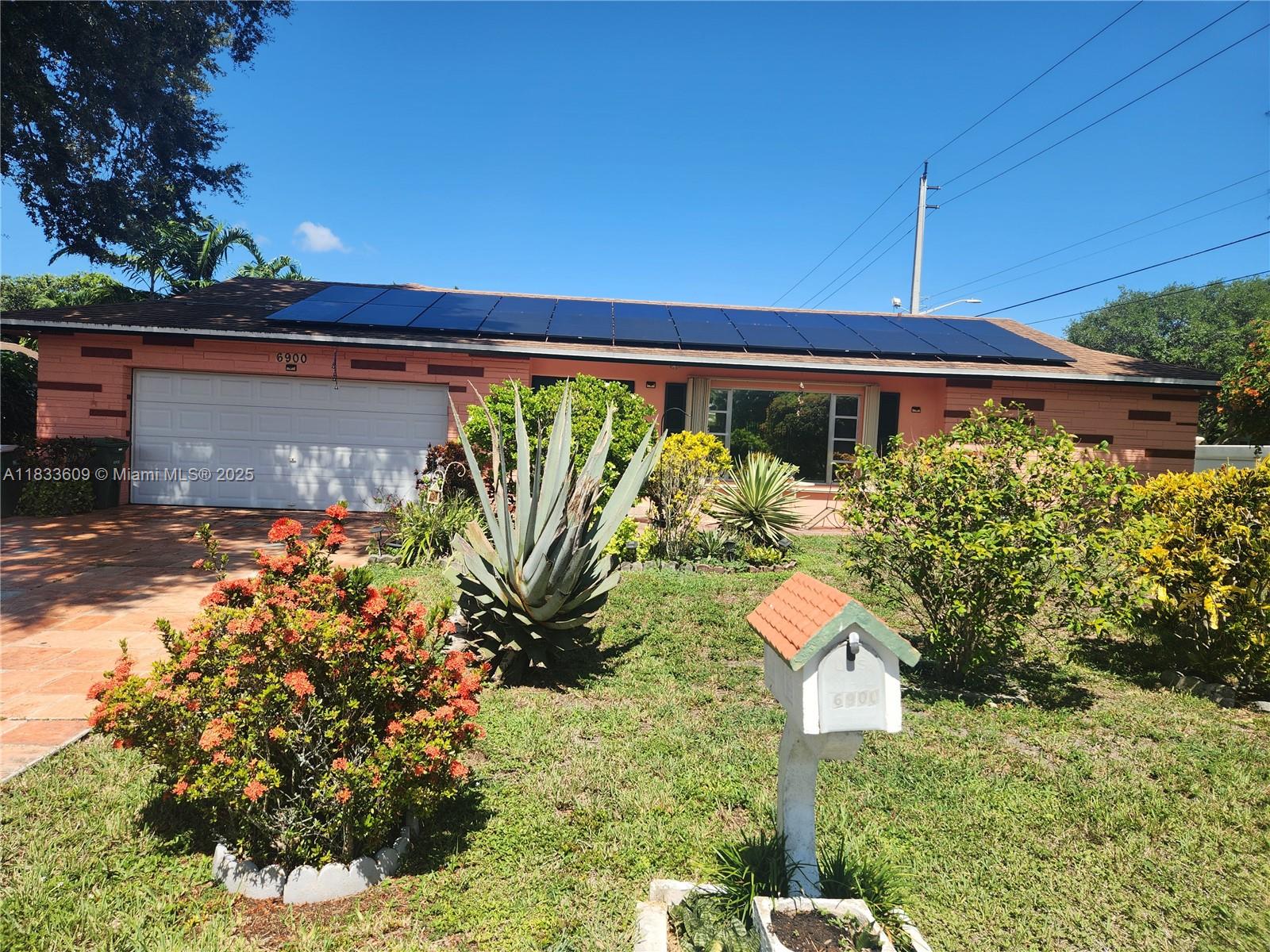 Large, rarely available 3-bed, 2-bath home on corner lot in well maintained 55+ Westwood community offering exceptional space-perfect for privacy & functionality. Enjoy peace of mind w/newer roof (2020) & accordion shutters. Spacious interior is perfect for relaxing & entertaining, w/desirable split bed layout-large rooms & closet space & redone master bath. Kitchen w/nook has granite & pull out drawers. Step outside to huge screened-in patio-ideal for year-round outdoor living, surrounded by fruit trees & privacy w/only 1 side neighbor (no back neighbors). 2-car garage provides storage & convenience. *Also-solar panels for decreased electric bills! Home is a serene retreat while still being close to everything you need. Shopping- Restaurants- Doctors/hospital & access to major roads