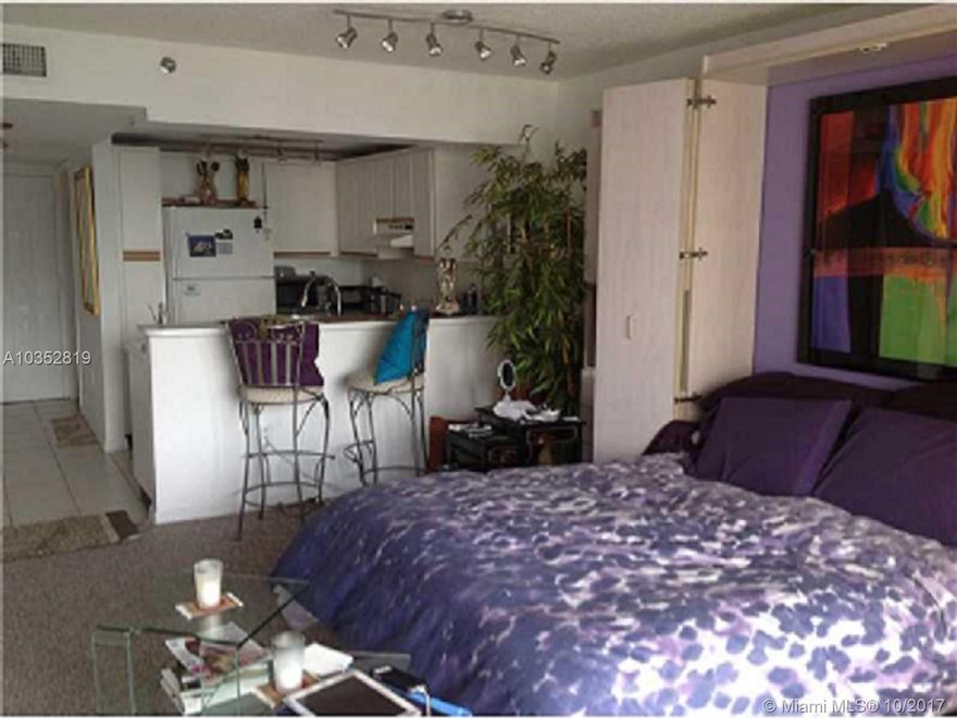 Great studio on exclusive Brickell Key.  Near downtown Miami.  Updated closets and bathroom.  Includes washer and dryer, built-in murphy bed, and 1 parking space.  Easy to show.  Just call listing agent.