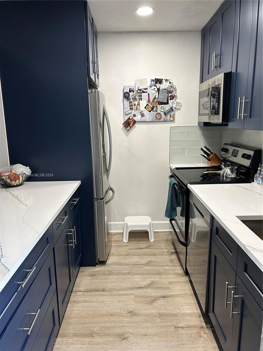 Darling Quiet Clean recently upgraded Kitchen, Bedrooms and Living Are with new floors and fresh paint! Main bedroom features king and newly designed closet. 2nd bedroom features queen bed. Available 4/25/25. Minimum 6 months