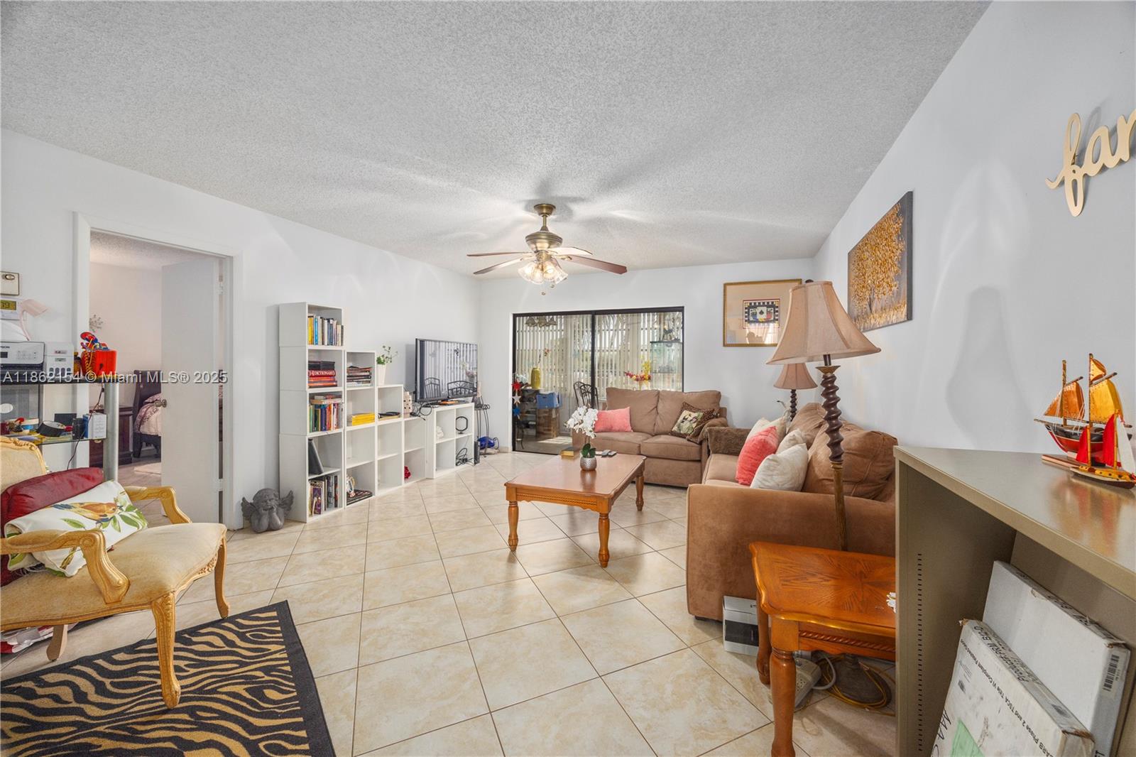 2 bed 2 bath canal front condo with a Florida room. 55+ community. Amenities include a heated pool, tennis, fitness room, clubhouse, billiards, shuffleboard, and a picnic area. Convenient to the turnpike, restaurants, grocery, shopping, medical, and more.