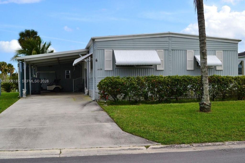 Photo of 1620 SW 64th Way #H, Boca Raton, FL 33428 (MLS # A12006185)