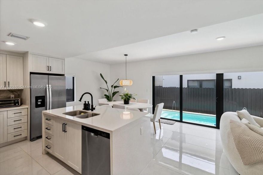 ...OPEN HOUSE SATURDAY JUNE 14 11:00AM TO 1:00PM....
This modern new construction features 5 bedrooms, 3 remodeled bathrooms, impact windows, porcelain tile throughout, and a smart home system. Includes a 19' x 7' in-ground pool, modern pergola, aluminum gates, and 5-camera security system. Bedrooms come with blackouts and blinds, plus modern drain gutters and custom upgrades throughout. Prime location near Fresh Market, Zoo Miami, and just 30 minutes from the Florida Keys. Stylish, secure, and move-in ready! The open-concept design is perfect for entertaining, with seamless indoor-outdoor flow. Spacious layout offers comfort and privacy for families or guests. Ideal for those seeking luxury living in a growing area.