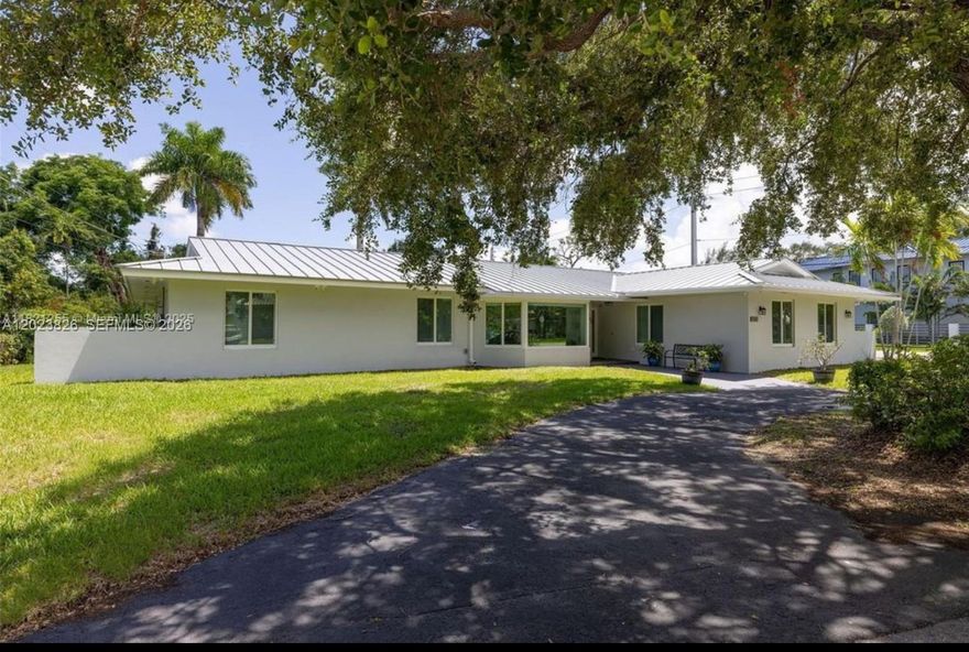 Welcome to this beautifully updated residence in the highly sought-after Killian Green Estates neighborhood. Situated on an expansive 0.36-acre lot lined with majestic royal palms, this 4-bedroom, 3-bathroom home offers the perfect blend of elegance, comfort, and South Florida living. Featuring 2,634 square feet of thoughtfully designed living space, the home welcomes you with bright open interiors, spacious living and dining areas, and seamless indoor-outdoor flow ideal for entertaining. The chef-inspired quartzite kitchen is the heart of the home, offering modern finishes, generous counter space, and a warm gathering atmosphere for family and guests alike.

The spacious primary suite serves as a private retreat complete with a walk-in closet plus two additional closets, providing exceptional storage and functionality. Additional bedrooms are generously sized and ideal for family, guests, or a home office. Step outside to your lush tropical backyard oasis with room to create the pool and outdoor entertaining space of your dreams.

Located in one of Miami’s most desirable areas, this home offers tranquility while remaining just minutes from top-rated schools, parks, shopping, dining, major expressways, and everything Pinecrest and Kendall have to offer. A rare opportunity to own a move-in-ready home on a large lot in an established, tree-lined neighborhood known for its charm and convenience. Experience timeless comfort, privacy, and the best of Miami living in this exceptional property.