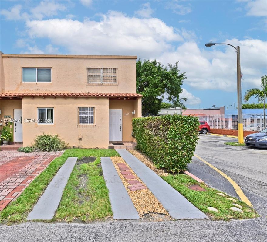 Renovated 2 Bed /1.5 Bath Corner Townhome located in the heart of Hialeah. This townhome features a generous layout with high-volume ceilings, tile flooring throughout, plus a custom kitchen complete with quartz countertops and wood cabinets. The townhome shows upgraded bathrooms and includes a washer & dryer inside the unit. Best of all the townhome offers a private driveway, and a spaciously fenced backyard with a separate storage shed!
