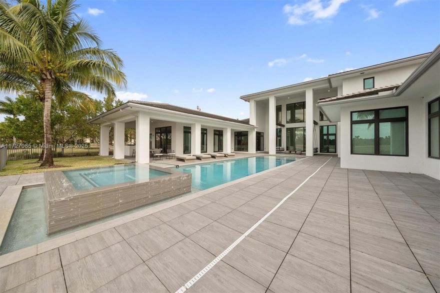 Welcome to a custom-built Zen-inspired retreat in exclusive Windmill Reserve. Built in 2018, 9,019 sqft estate sits on 28,172 sqft lot with serene preserve views and no rear neighbors. 7 en-suite bdrms and 8.5 baths, home is designed for luxury. Chef’s kitchen with Thermador appliances, oversized quartz island, pot filler, gas range, wall oven, butler’s pantry, and wet bar area. Primary suite with dual walk-in closets, sitting area, spa-like bathroom retreat with standing tub inside of shower and dual sinks. Entertain with wine cellar, media room, loft area, and smart home technology, 4 car garage,  gym, and security system.  Outdoors, enjoy 60x16  saltwater infinity-edge pool, heated spa, covered lanai, custom swings, and yard prepped for summer kitchen. See attached the feature list.
