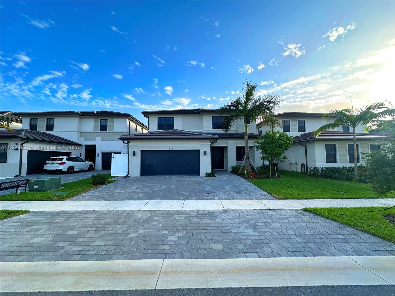 Beautiful 4-bedroom, 4-bathroom home conveniently located near the i-75 and not far from The Shops at Pembroke Gardens, you'll find both commuting and shopping exceptionally accessible. The property has parking for up to 7 cars, including a 2-car garage. Once inside, the home dazzles with zebra blinds in communal areas, blackout blinds in bedrooms, and elegant chandeliers. The bathrooms come fully equipped with all the essentials, freeing you from the fuss of setup. Best of all, we're pet-friendly! This unfurnished haven is ready for your personal touch. Don't miss this chance; schedule a viewing today!