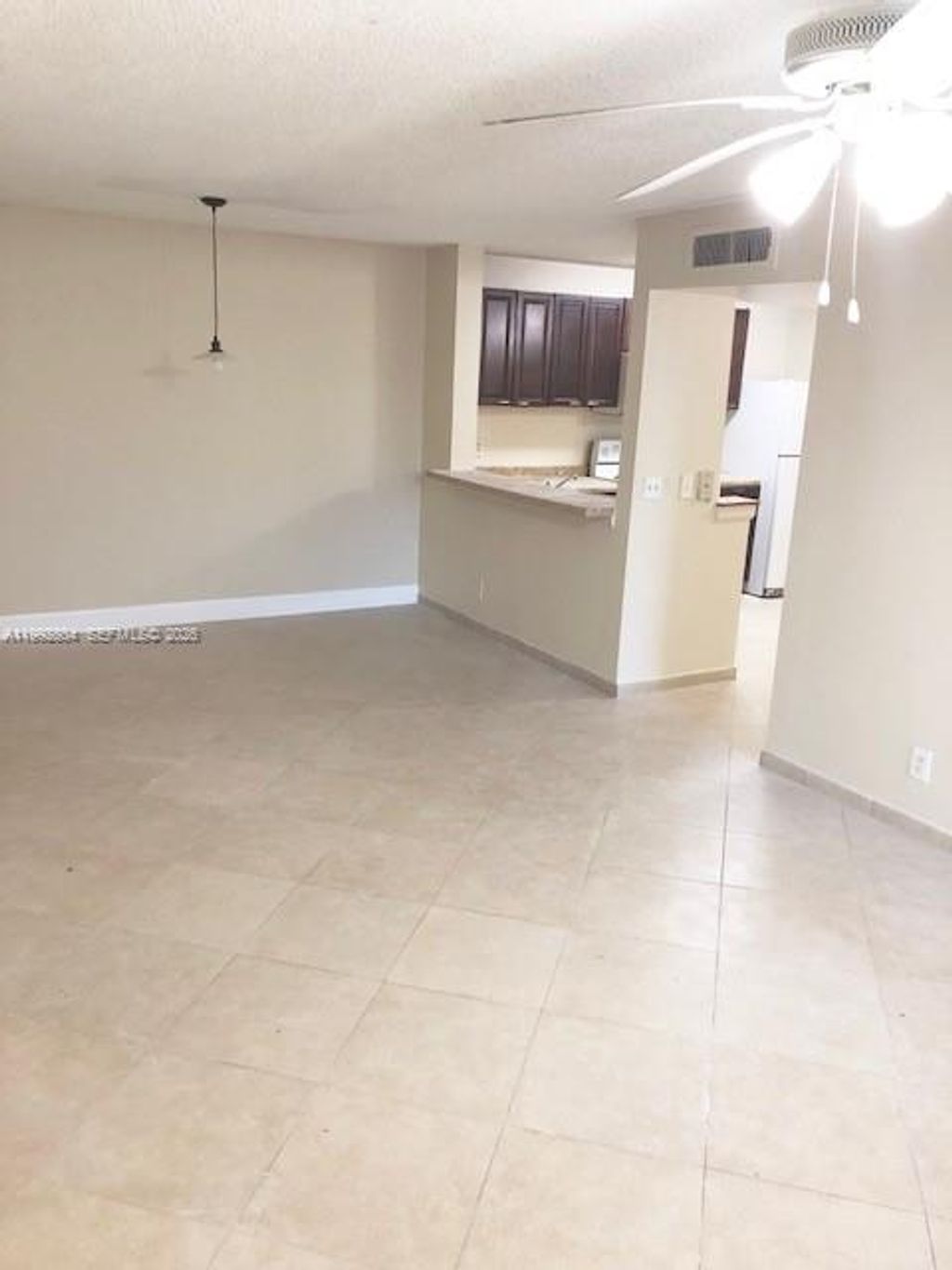 Photo of 10749 Cleary Blvd #101, Plantation, FL 33324 (MLS # A11992804)