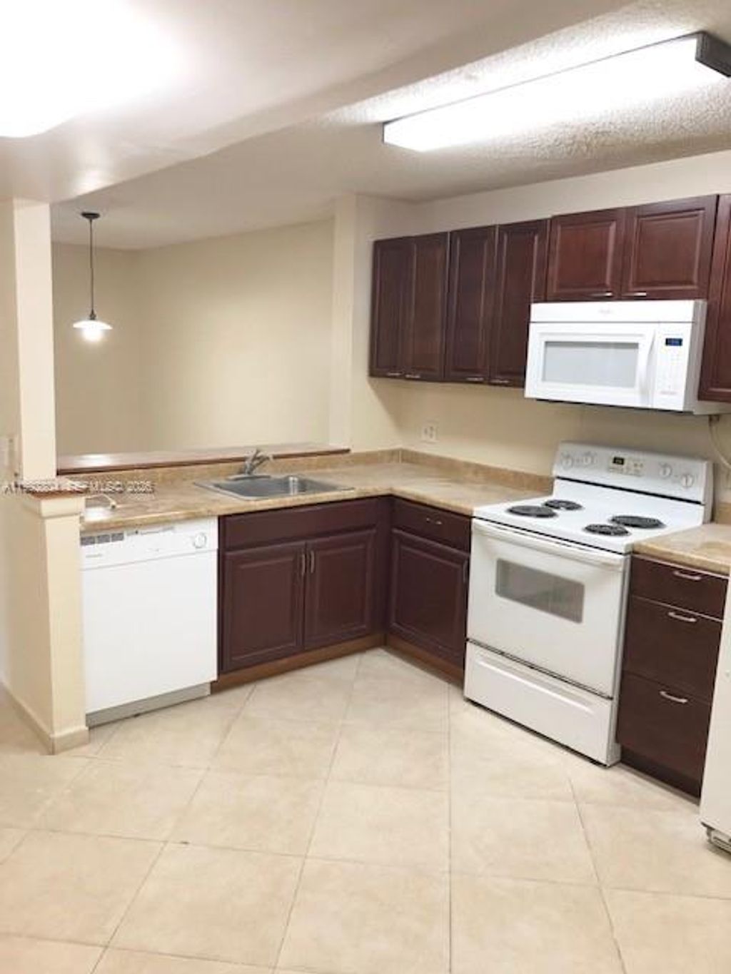 Photo of 10749 Cleary Blvd #101, Plantation, FL 33324 (MLS # A11992804)