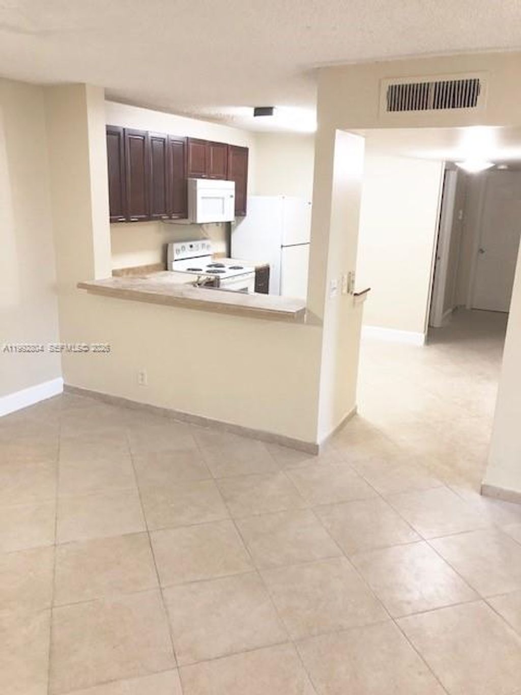 Photo of 10749 Cleary Blvd #101, Plantation, FL 33324 (MLS # A11992804)
