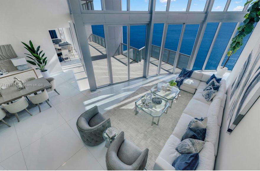 Exceptional 43rd-floor Duplex Penthouse at Jade Beach in Sunny Isles, offering 4,141 SF of sophisticated living. This stunning two-story residence features soaring 22’ ceilings, a private elevator, and floor-to-ceiling windows showcasing panoramic ocean, intercoastal and city views. Enjoy a flow-through layout with four spacious terraces, maid’s quarters, flexible space for office or lounge, and a sleek modern staircase. The gourmet kitchen includes Miele appliances, SubZero refrigerator, built-in coffee system, two ovens and wine cooler. The luxurious primary suite offers two walk-in closets and dual bathrooms. Electric blinds throughout. Jade Beach provides world-class amenities: beach and pool service, spa, fitness center, and playrooms. Minutes from Bal Harbour and Aventura Mall.