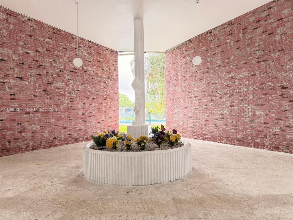 Photo of 6503 Winfield Blvd #111-D, Margate, FL 33063 (MLS # A11986894)