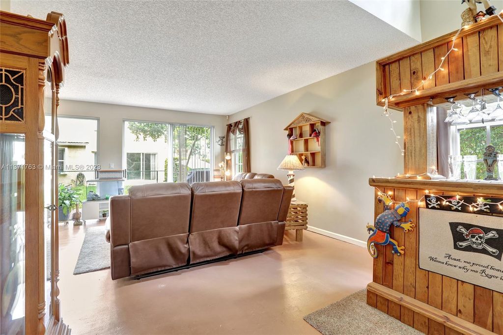 Photo of 4707 NW 114th Ln, Coral Springs, FL 33076 (MLS # A11371763)