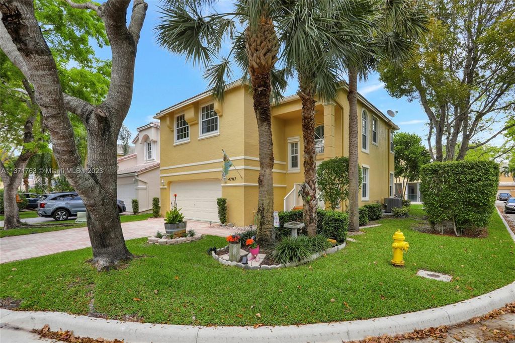 Photo of 4707 NW 114th Ln, Coral Springs, FL 33076 (MLS # A11371763)