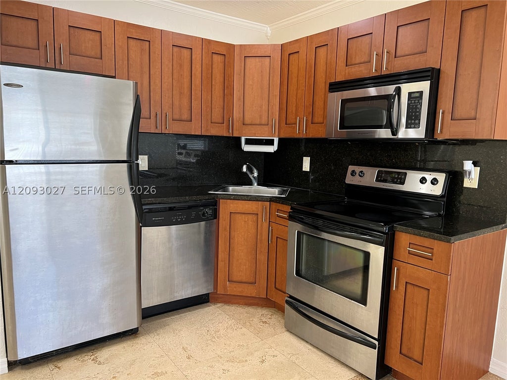 Photo of 1872 NE 46th St #D4, Fort Lauderdale, FL 33308 (MLS # A12093027)