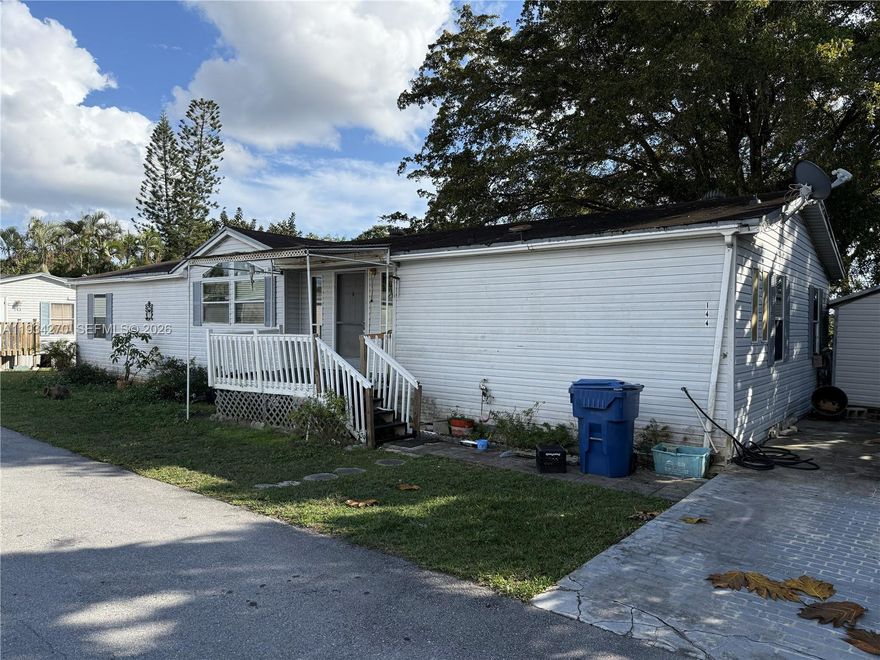 3 Bedroom 2 bath, 1690 Sq Ft home in the gated American Village Community, with pools, basketball court, tennis court, kids' play area, clubhouse, security guard, and low maintenance. This is one of the larger units, other units are 1,100 sq ft or 1,400 sq ft. Kitchen and bathrooms are original. Large lot with enormous backyard with no neighbors at the back. Plenty of parking. Seller financing available with 30% down.