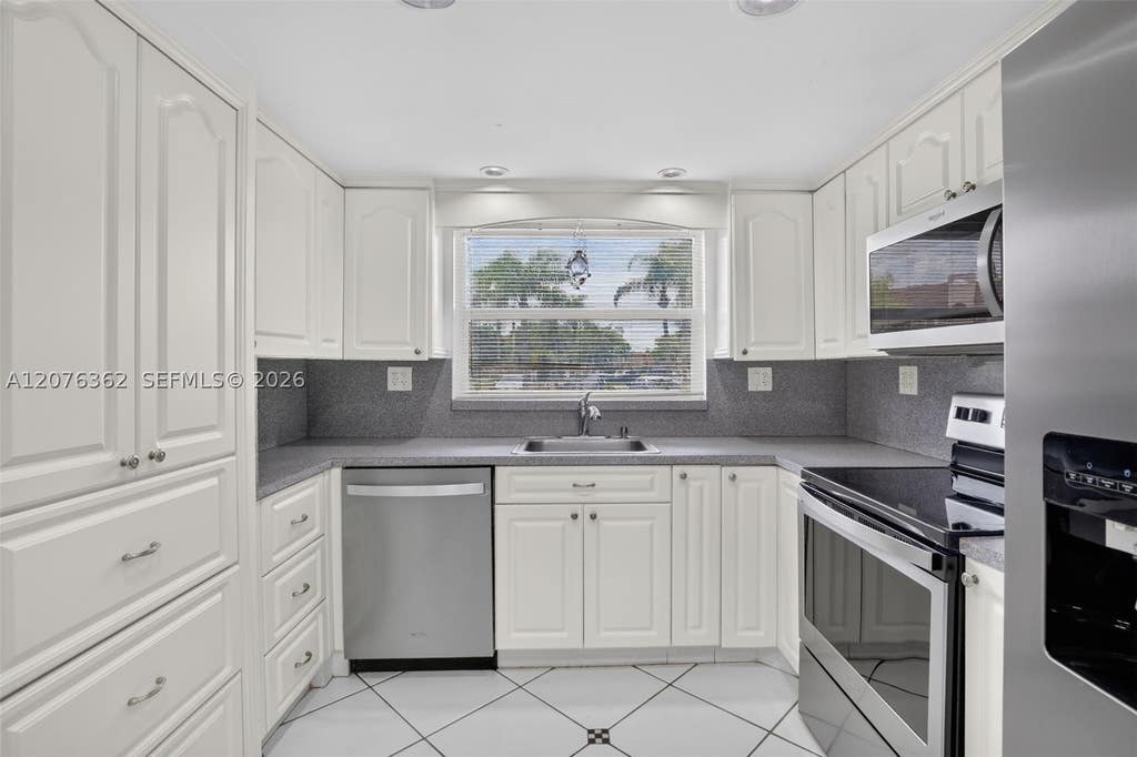 Photo of 9721 Sunrise Lakes Blvd #102, Sunrise, FL 33322 (MLS # A12076362)