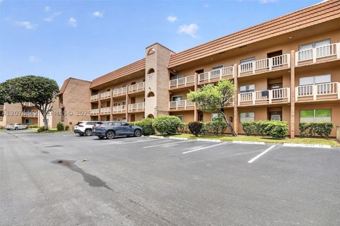 Photo of 9721 Sunrise Lakes Blvd #102, Sunrise, FL 33322 (MLS # A12076362)