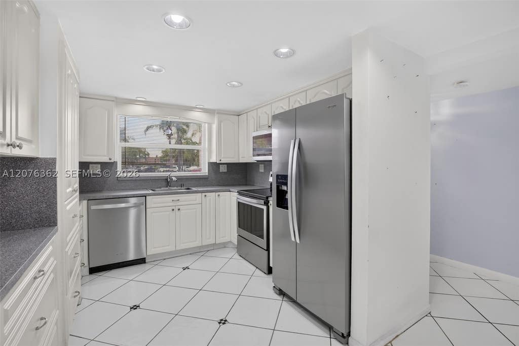 Photo of 9721 Sunrise Lakes Blvd #102, Sunrise, FL 33322 (MLS # A12076362)