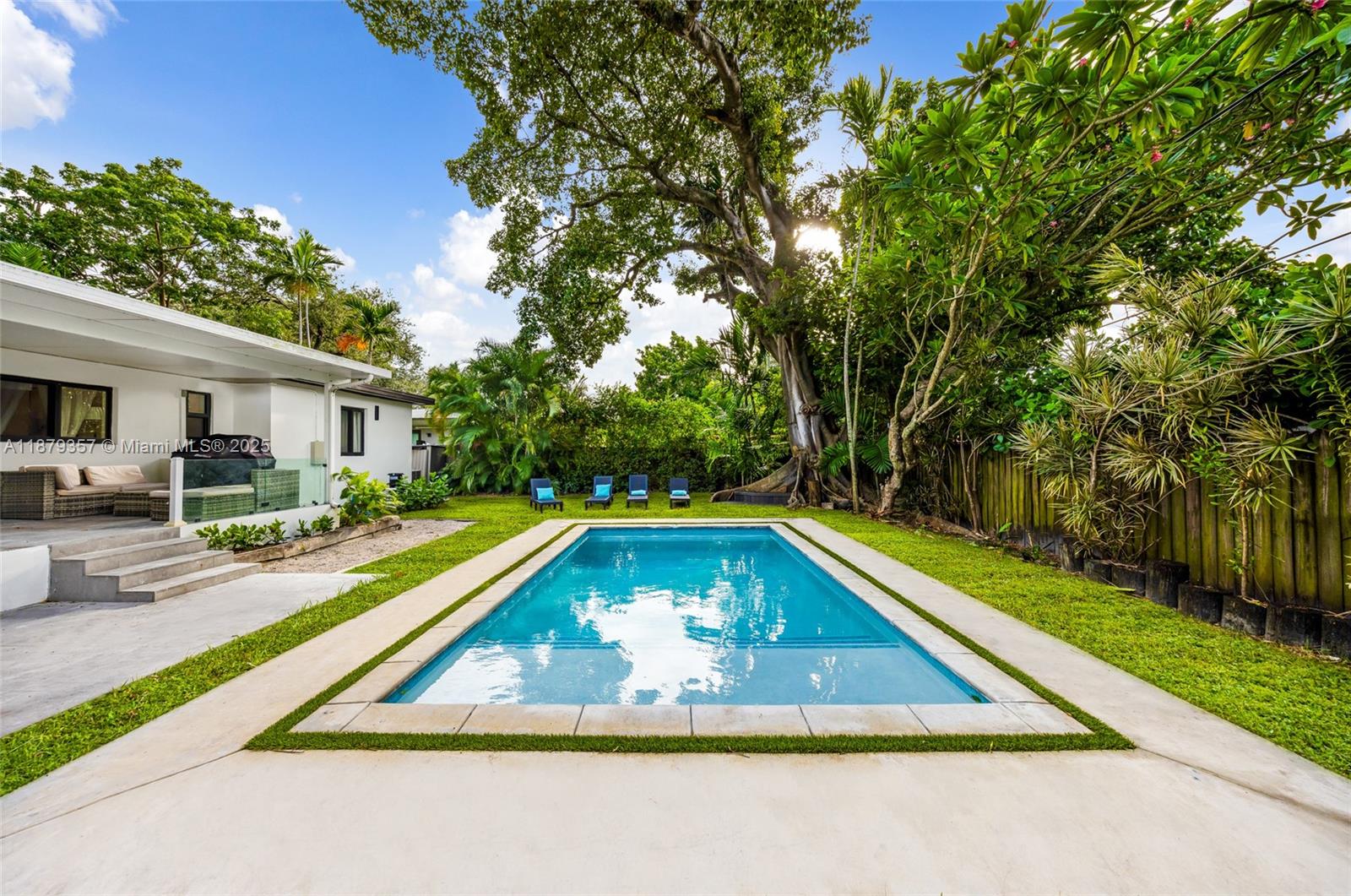 Discover your dream home in the serene neighborhood of Buena Vista/Design District! This completely remodeled single-family home boasts 4 bedrooms and 2 bathrooms, featuring high-end finishes throughout. Enjoy elegant 24x48 imported Spanish porcelain flooring and a stunning custom kitchen equipped with brand new black stainless steel appliances. This house includes new electrical and PVC plumbing, new pool, and IMPACT windows. Gorgeous trees at the property with a beautiful pergola and glass railings to enjoy the backyard! The property also features a new driveway, all situated on a spacious lot of nearly 7,000 sqft.