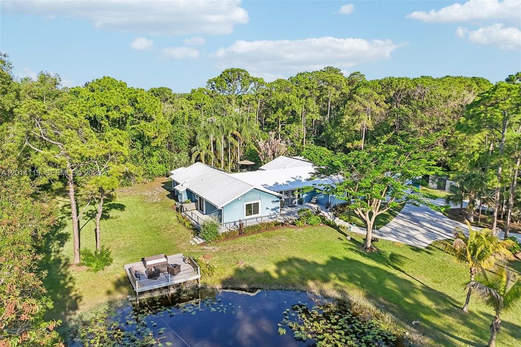 Photo of 15698 N 77th Trl N, Palm Beach Gardens, FL 33418 (MLS # A12014119)