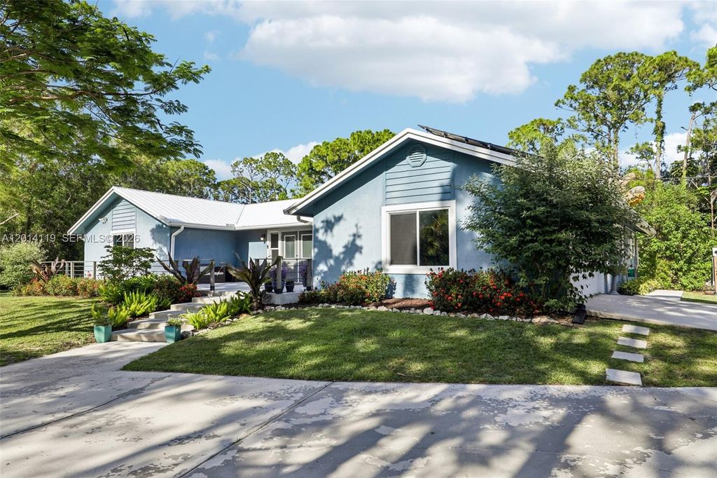 Photo of 15698 N 77th Trl N, Palm Beach Gardens, FL 33418 (MLS # A12014119)