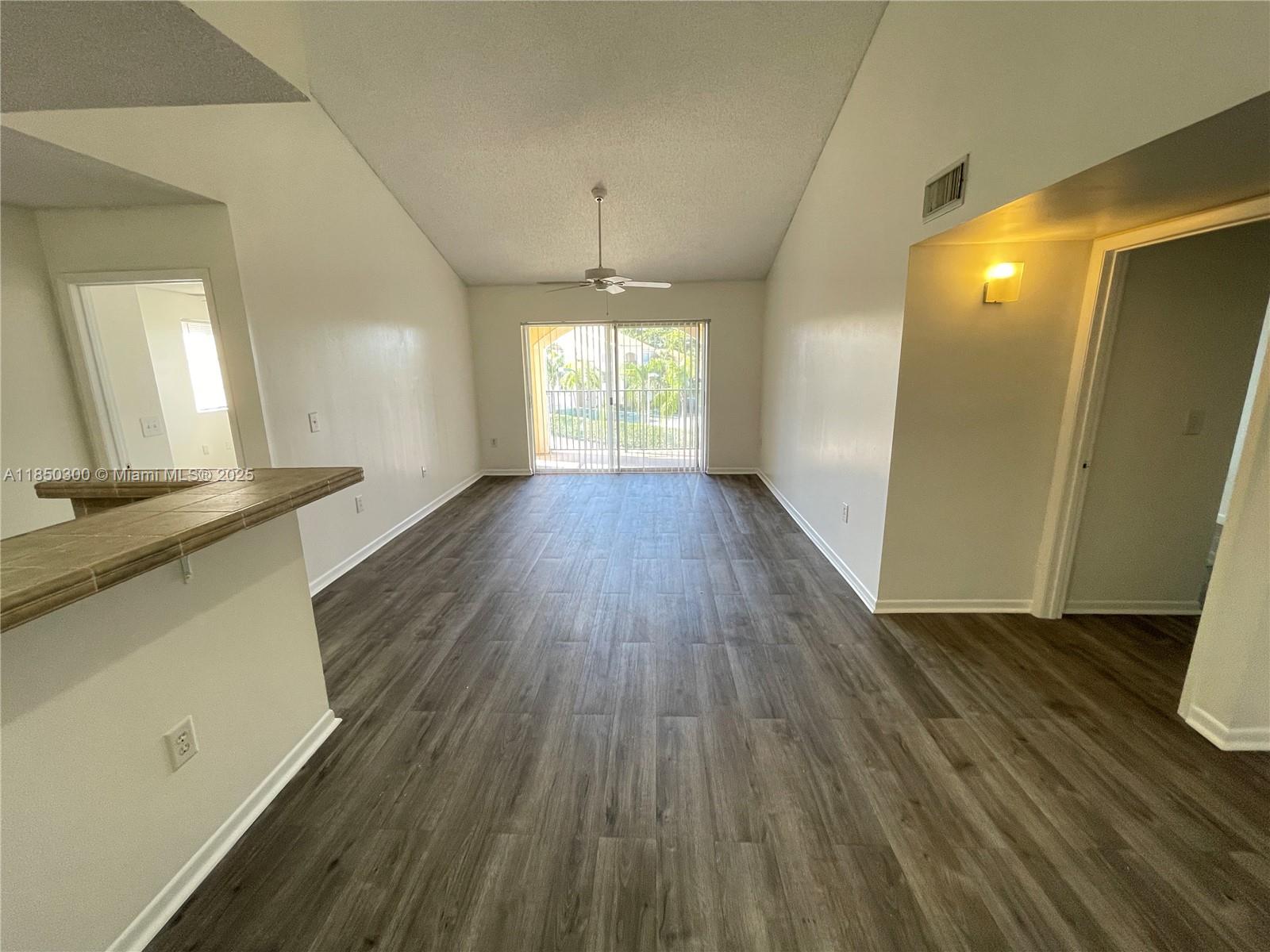 This beautifully maintained top-floor unit offers a modern, open layout with laminate flooring in the living area and stainless steel appliances in the kitchen. Convenient in-unit washer and dryer included. Located in a sought-after, gated community, the condo offers fantastic amenities, including a large pool, whirlpool, gym, indoor racquetball court, sand volleyball, play area, and picnic areas with grills. Whether you're looking for a comfortable place to live or a great rental investment, this unit is perfect for both. Enjoy the best of community living and an excellent location. Don’t miss out on this opportunity!----------UNIT RENTED TILL 2/28/2026, PAYS $2,000.00 PER MONTH - tenant can show the unit Mondays and Tuesdays