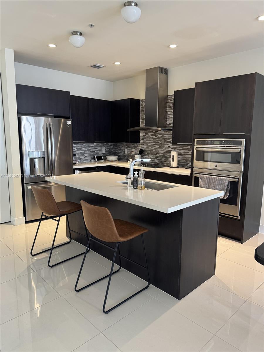 Charming ground-floor unit with a private parking space directly behind! Located in the sought-after Landmark community, this home features a convenient single-story layout—no stairs—and easy access from both the front and back entrances. The parking space is extra long, allowing room for two small vehicles parked tandem. Meticulously maintained, offering a tasteful and move-in-ready space. Will be delivered freshly painted. Enjoy access to the community’s impressive family-friendly amenities and benefit from nearby A+ rated schools.