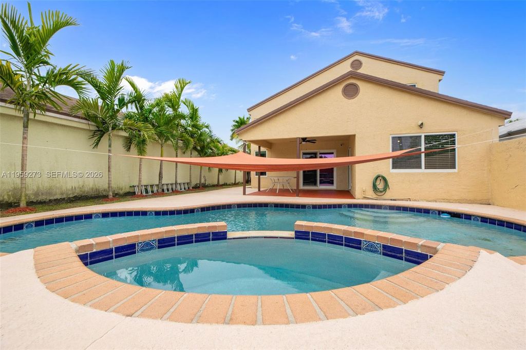 Photo of 2050 NW 37th Ave, Coconut Creek, FL 33066 (MLS # A11959273)