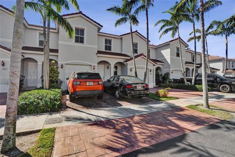 Photo of 1042 NE 207th Ter, Miami, FL 33179 (MLS # A11956871)