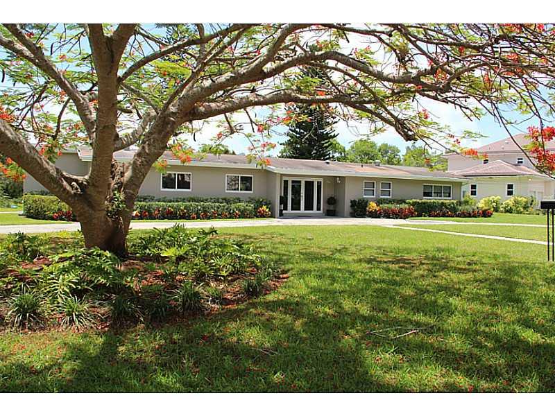 Charming house with natural light and serene lake views from almost all living areas. Completely updated, open floor plan, 3 bedrooms, 3 baths + den on 20,565 corner lot. Beautiful floors, modern kitchen and baths. Covered terrace, impact windows and circ ular driveway. Great schools. NO PETS.