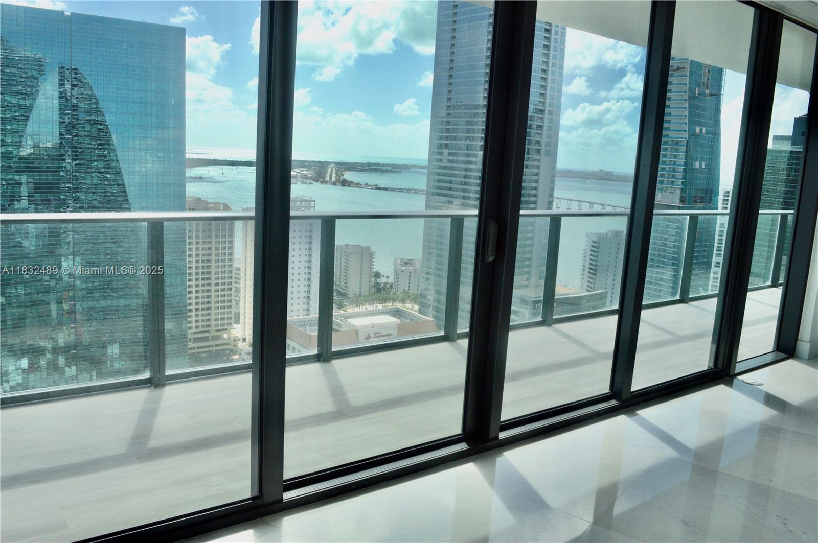 Stunning corner unit with an amazing layout, features 2 bedroom and 2 baths + DEN. Floor to ceiling windows offer breathtaking skyline and ocean views from every room. Marble
floors, electrical blinds, BOSCH and Subzero appliances. State-of-the-art amenities that include gym, game room, pool and sky roof with breathtaking views.
Experience the epitome of five-star living where every detail is designed to elevate your lifestyle. Located in the most residential area of Brickell steps away from the best restaurants and shopping in Miami.