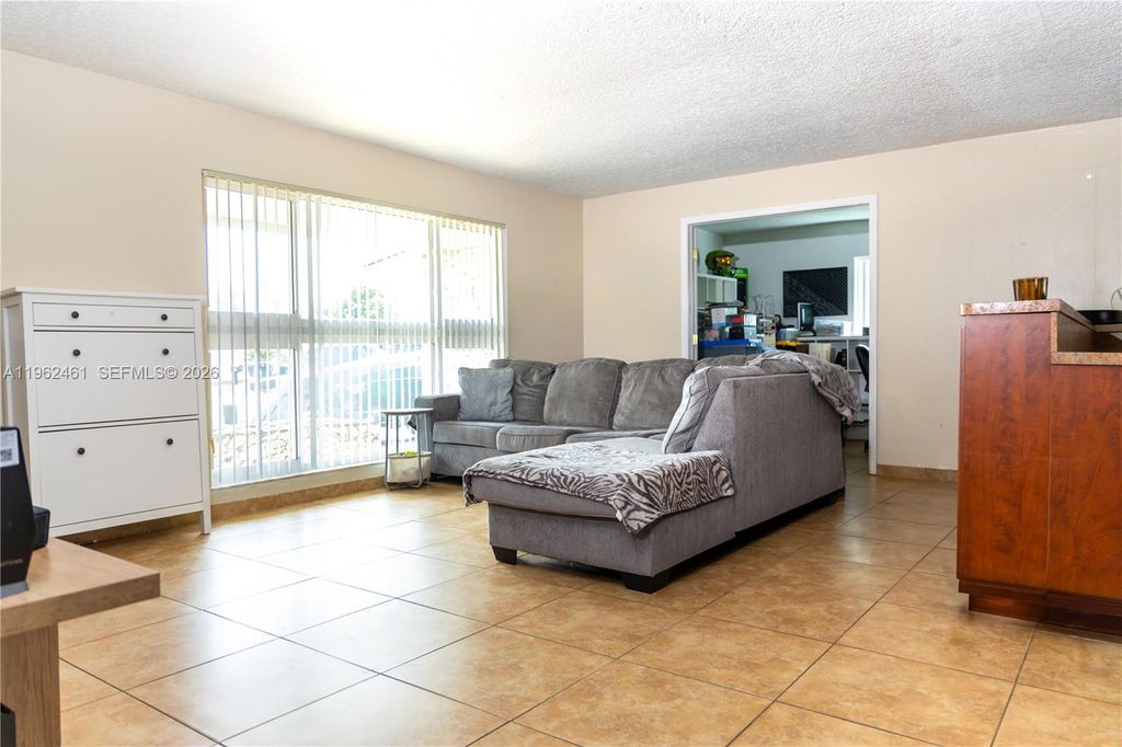 Photo of 9161 NW 26th Pl, Sunrise, FL 33322 (MLS # A11962461)